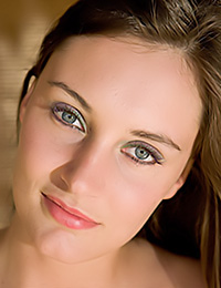 She is looking at you with her beautiful eyes
