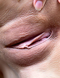 Big blue-eyed brunette teen Vittoria A loves posing nude in the mirror.