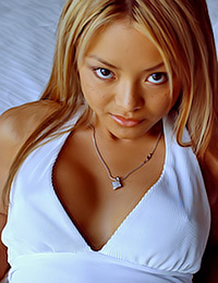 Impressively hot girlie Tila is an Asian chick and comes here to show off her hottest poses for you