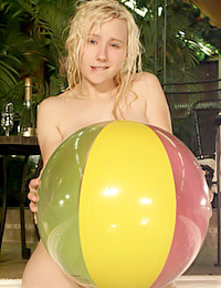 Sexy blonde babe masturbates inside the pool.